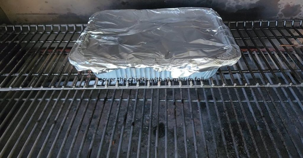 cover the cheeks with aluminum foil