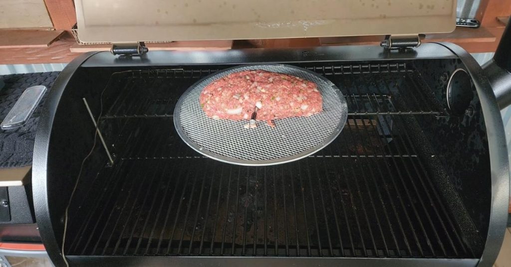 place the meatloaf on the grate