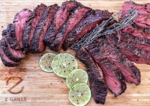 Sliced coffee-marinated tri-tip showing a perfectly cooked medium-rare center