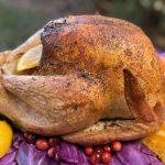 Golden smoked turkey with crispy, flavorful skin for Thanksgiving